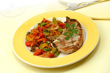 Pork chop with vegetables.