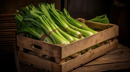 Wooden crate filled with fresh and hearty leeks