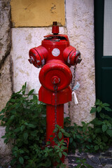 Red fire hydrant in Lisbon, Portugal.