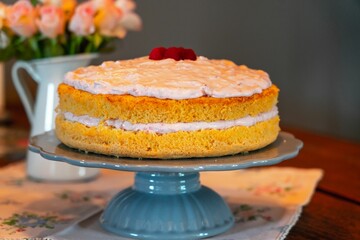 Closeup shot of a homemade creamy cake on a platter