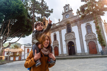 Family tourism visiting the Basilica of Nuestra Senora del Pino in the municipality of Teror. Gran Canaria, Spain