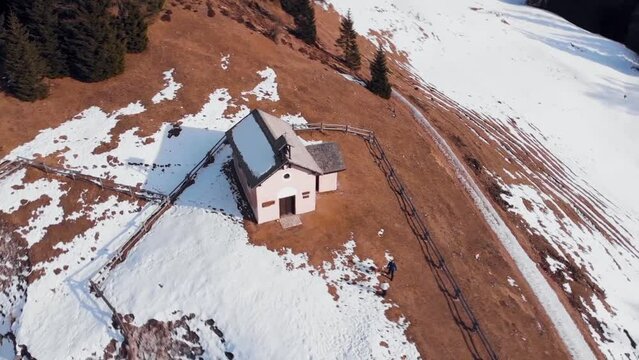 Aerial view of a small hut in the Dolomites Alps, Northeastern Italy