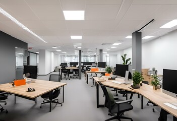 A modern and professional office space featuring several desks and computer workstations