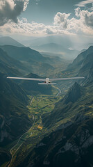 A glider being released from its tow plane, silently soaring over a scenic valley, emphasizing the beauty of silent flight - obrazy, fototapety, plakaty