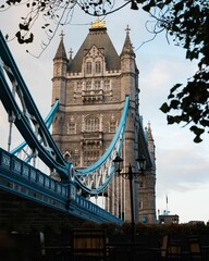 Fototapeta na wymiar Vertical shot of the Tower Bridge during a daytime