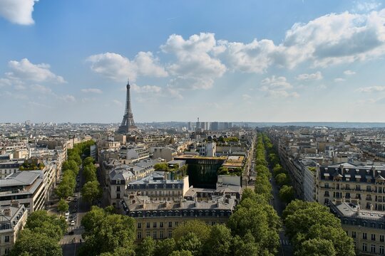 Famous Avenue Foch and the Eifel tower on a sunny day