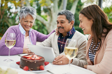 Senior, couple and daughter, outdoor and tablet for celebration of anniversary of parents with...