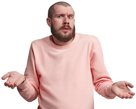 What emotions. Young man expressing misunderstanding and frustration, spreading hands with questioning face isolated on transparent background. Concept of human emotions, facial expression.