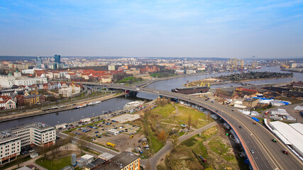 Fototapeta premium March panorama of Szczecin taken by drone, featuring the city's architecture and the Oder.