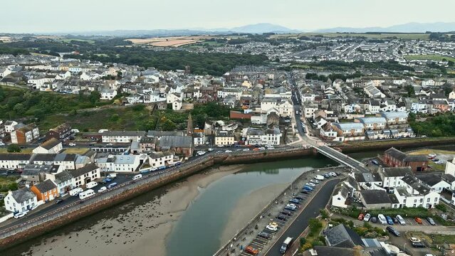 Drone footage flyover Maryport fishing village houses in Allerdale a borough of Cumbria, England