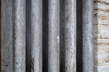 Fototapeta premium Close Up of Carved Detail on Entrance Pillars of Old Stone Church