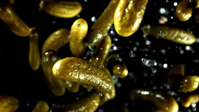 Super slow motion Pickled cucumbers. High quality FullHD footage