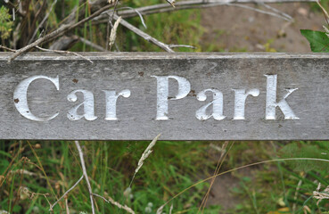 Close Up of Old Outdoor Wooden Sign 'Car Park' 