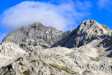 Triglav mountain summit with Dom Planika shelter in Triglav National Park Slovenia