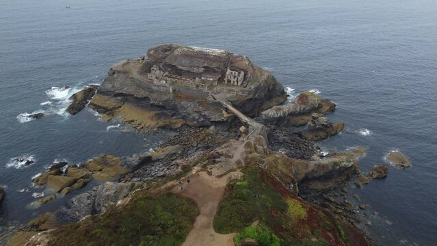 Roscanvel, France - August 23, 2022: Le fort du Capucin (Islet of the Capuchins) is a rocky islet at the foot of a cliff in the commune of Roscanvel, on the Crozon peninsula. 