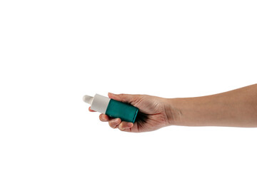 Fototapeta premium Blue glass cosmetic bottle in hand, Skin care or sunscreen cosmetic on transparent background.