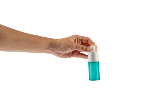 Blue glass cosmetic bottle in hand, Skin care or sunscreen cosmetic on transparent background.