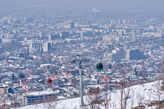 Cable car to Mount Kok Tobe, landmark of Almaty, Kazakhstan. Spring cityscape.