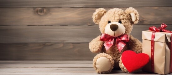 Teddy bear near gift box