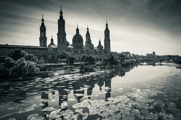 Cathedral Basilica of Our Lady of the Pillar in Zaragoza, Spain, beside the river ebro in black and white