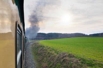 Zugfahrt Rasender Roland, Blick aus dem Fenster, Rauchfahne der Dampflok, Insel Rügen, Ostsee,...