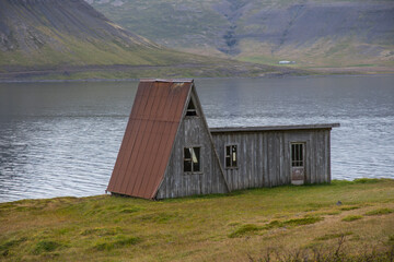 Fototapeta na wymiar An abandoned cottage in Fossfjordur in the Icelandic westfjords
