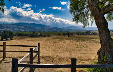 Fototapeta na wymiar Farm fence. landscape with fence and mountains