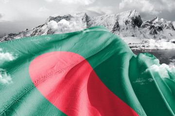 Bangladesh national flag cloth fabric waving on beautiful ice Mountain Background.