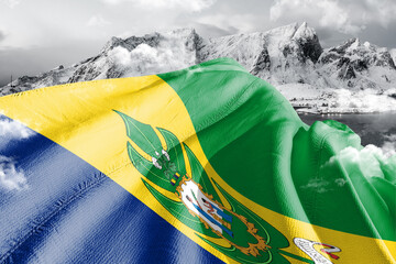 Saint Vincent and the Grenadines national flag cloth fabric waving on beautiful ice Mountain Background.