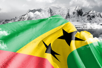 Sao Tome and Principe national flag cloth fabric waving on beautiful ice Mountain Background.