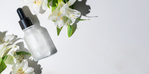Serene beauty serum with fresh white flowers
