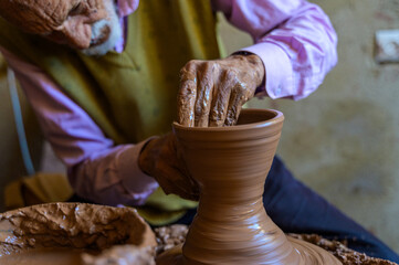 Traditional pottery making by skilled artisan