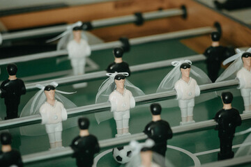 Table football decorated for wedding celebration, game for wedding buffet - obrazy, fototapety, plakaty