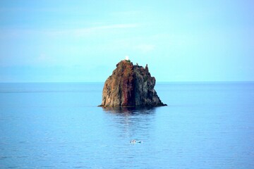 Strombolicchio - Aeolian Islands/Italy - view of the smoking volcano from the sea