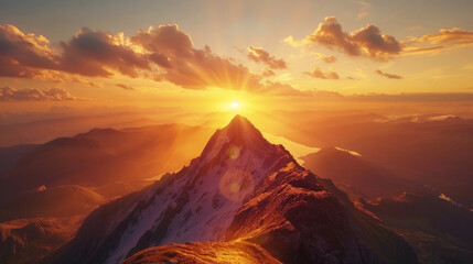 Fototapeta premium A majestic, untouched mountain peak glowing in the morning light, surrounded by unspoiled wilderness.
