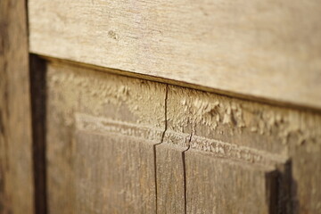 Closeup old wooden door with cracks