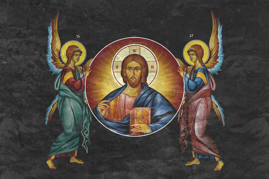 Christian traditional image of Jesus Christ and Archangels. Religious illustration on black stone wall background in Byzantine style