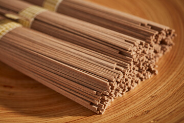 Bunches of uncooked soba, the buckwheat pasta popular in Japan and Korea.