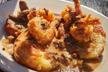 Shrimp, biscuits, and gravy. A classic of Gullah Getchee cuisine served in the Low Country near Beaufort, South Carolina