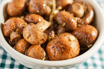Baby Bella mushrooms marinated in wine vinegar and garlic