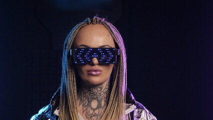 Glowing night club LEDs eye wear cyberpunk women. Future 2077 cyber punk glasses. Hypnotic arrows...
