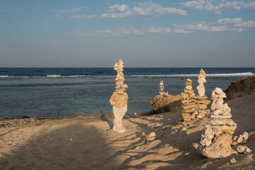 lot of stacked corals at the sandy beach at the red sea