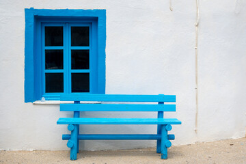 White blue facade of Greek building in Mandraki port on the island of Nisyros. Dodecanese, Greece