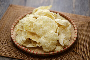 Emping, Indonesian crackers made from crushed Belinjo nuts. After frying.