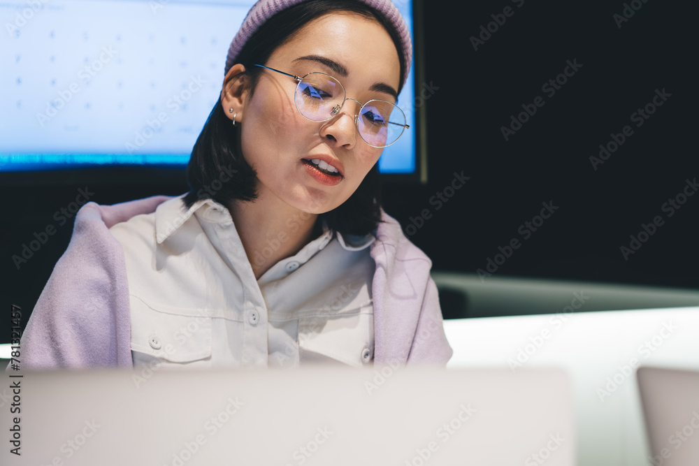 Poster young female it professional in optical eyeglasses for provide vision correction browsing web inform
