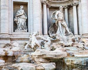 Detail of the famous Trevi Fountain in Baroque architecture in Rome.Major attraction and tourist...