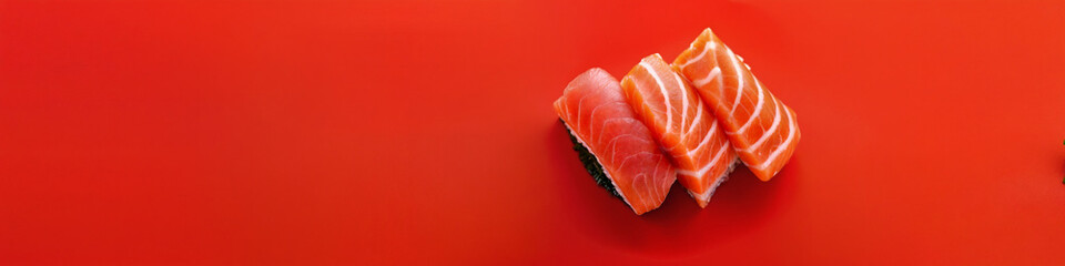 A close-up of  pieces of sushi on red background, Concept  for Food Magazine, Japanese Cuisine Promotion, Menu, Poster, Banner