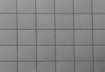 Contemporary Facade Design. Square Pattern in Modern Building Wall. Abstract canvas, background. Monochrome detail.