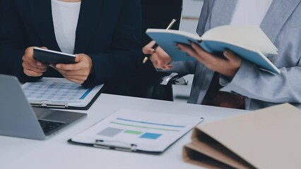 Business team project manager working and update tasks with milestones progress planning and professional investor working new start up project in the office.