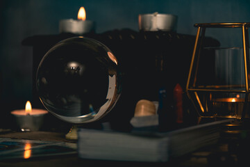 Crystal Ball and Candles: A Mystic's Tools.